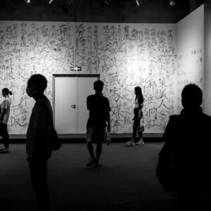 a group of people standing in a room